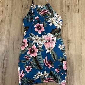 Cute mini dress with cut out back detail, perfect for summertime!